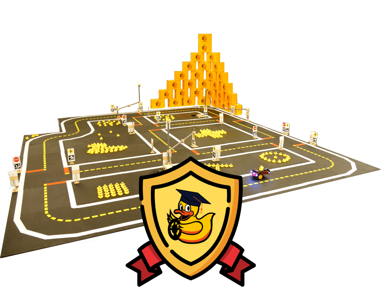 The Duckietown Class-in-a-box includes hardware, software and pedagogical materials needed to run a top university level class in robot autonomy, AI and underlying topics