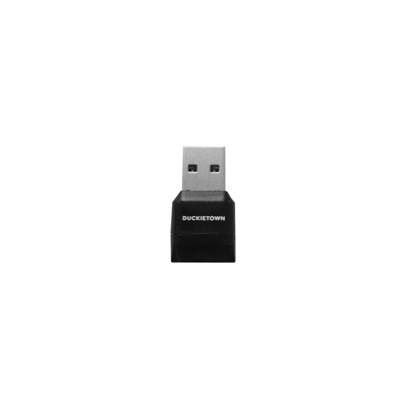 Black USB adapter with 'Duckietown' branding on a white background